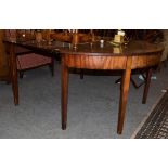 A George III mahogany D-end dining table, 200cm by 143cm by 76cm