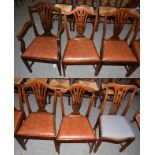 A set of five reproduction mahogany shield back dining chairs including one carver (5)