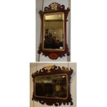 A George II style walnut and parcel gilt mirror and a similar smaller example (2)