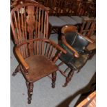 A 19th century elm smokers chair, and an oak and elm Windsor chair of similar date with crinoline