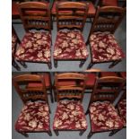 A set of early 20th century mahogany dining chairs with floral upholstered padded seats (6)