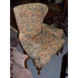 A George III style wing back armchair