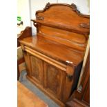 A Victorian mahogany chiffonier, the base with a moulded drawer and two cupboard doors