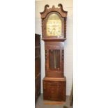 A Victorian thirty hour longcase clock with painted arched dial