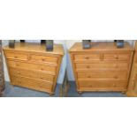 A pair of pine five drawer chests, of two short over three long graduated drawers, 91cm by 41cm by