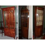 Two reproduction mahogany freestanding corner cupboards and a reproduction mahogany display cabinet