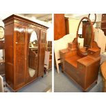 A mahogany inlaid wardrobe and dressing table