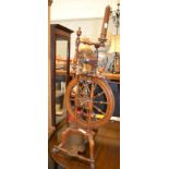 An 18th century walnut spinning wheel