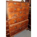 A George II walnut seven-drawer chest on chest Numerous repairs to moulding and veneers, some