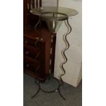 A reproduction hardwood four division Canterbury and a glass and metal plant stand (2)