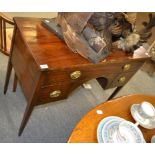 An early 19th century mahogany side table