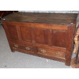 A joined oak chest with hinged lid