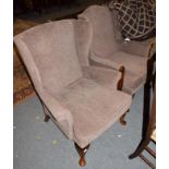 A pair of Parker Knoll wingback armchairs (2)