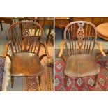 A pair of 19th century wheel back Windsor armchairs