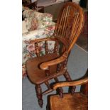 A 19th century oak and elm Windsor chair