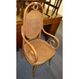 A Bentwood cane seated armchair labelled 'Dinette'