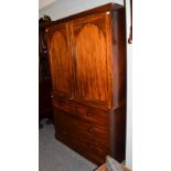 A 19th century mahogany linen press, 122cm by 54cm by 196cm