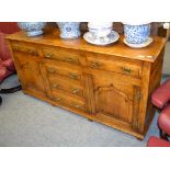 An oak Titchmarsh & Goodwin style dresser base, 169cm by 39cm by 83cm high