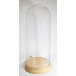 A Large Modern Glass Dome, mounted upon a circular oak base, diameter 24.5cm, dome height 60cm,