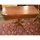 A Regency mahogany and ebony-strung fold-over tea table