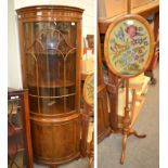 A reproduction mahogany bow-fronted free-standing corner cupboard together with a walnut pole-