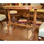 A Victorian figured walnut and quarter veneered occasional table