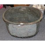 An oval copper riveted log bin, 70cm diameter