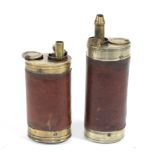 A Brass Combination Pistol Flask, of oval section, with external steel spring,