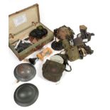 A Quantity of Second World War and Post War Militaria, including a 1939 date Brodie helmet,