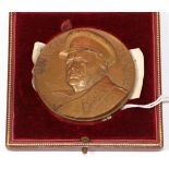 A Bronze Medallion Commemorating Sir Winston Churchill's Role in the Liberation of France,