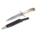 A Victorian Bowie Knife, with 16cm single edge clip point steel blade,