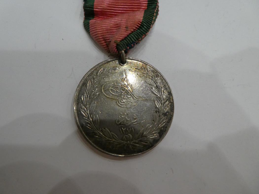 A Victorian Group of Three Medals, comprising Crimea Medal with clasp SEBASTAPOL, awarded to LIEUT. - Image 14 of 26