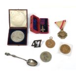 A Small Quantity of Medals and Militaria, comprising:- a white metal historic medal,