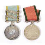 A Crimea Medal, with two clasps AZOFF and SEBASTAPOL, the edge hand punched,