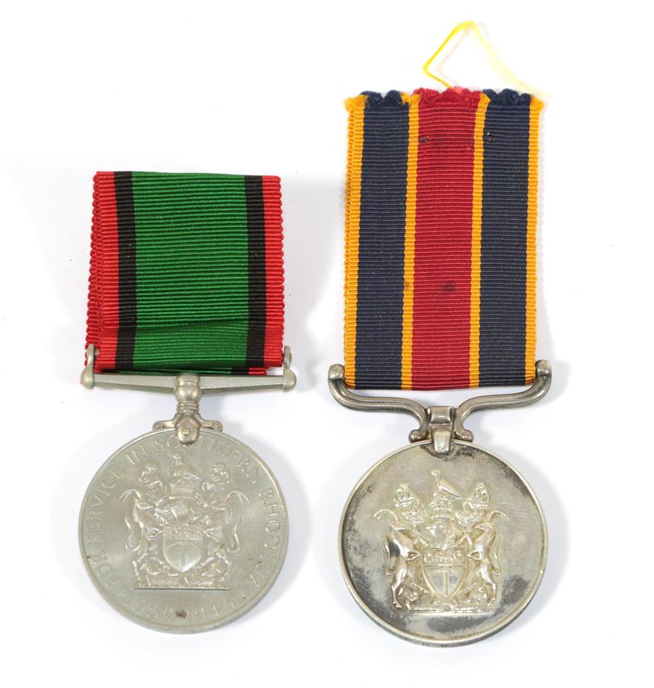 A Southern Rhodesia Service Medal & Police Reserve Faithful Service Medal,