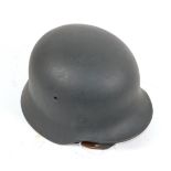 A Copy of a German Third Reich M40 Army Helmet, with dark green/grey 'Rauhlack' finish,