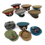 A Collection of Nine Various Soviet Russian Hats, comprising an Army Ushanka hat,