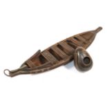 A 20th Century Carved Wood Model of a Five Man Canoe/Sailing Boat, possibly Solomon Islands,