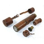A First World War Military Brass Single Draw Telescope, with 5cm lens, stitched leather sleeve,
