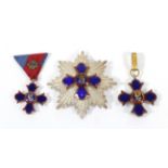 A Continental Blue and Red Enamelled Garter Breast Star,