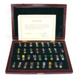 A Commemorative Set of Thirty Four Rhodesian Miniature Medals and Awards,