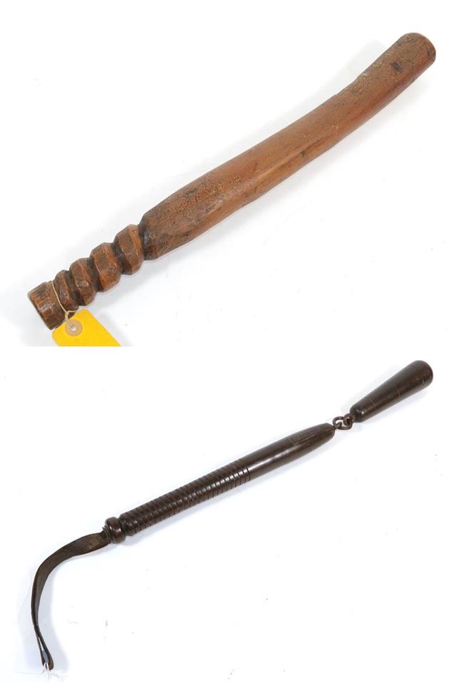 A 19th Century Dark Stained Wood Bludgeon, of the flail type, with metal linkage,