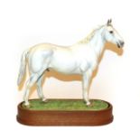 Royal Worcester 'Hunter', model No. RW4096 by Doris Lindner, 14/500, on wooden plinth, with framed