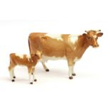 Beswick Guernsey Cow, first version, model No. 1248A and Guernsey Calf, model No. 1249A, golden