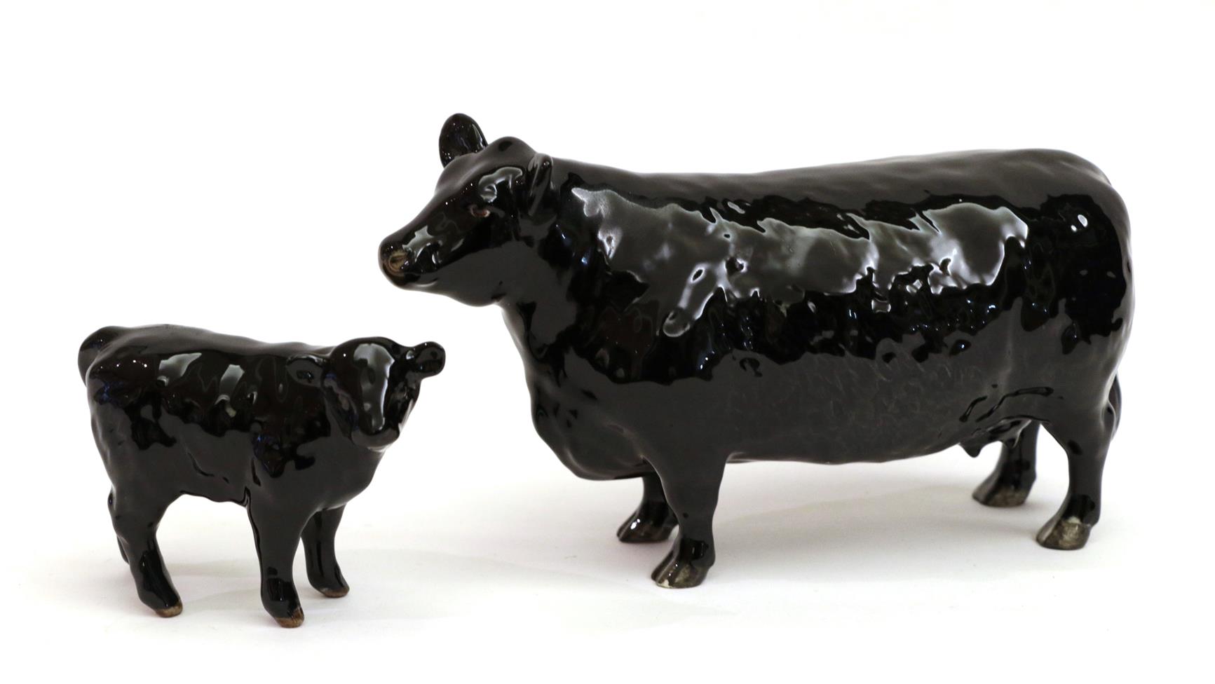 Beswick Aberdeen Angus Cow, model No. 1563 and Aberdeen Angus Calf, model No. 1827A, black gloss (