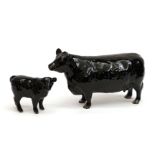 Beswick Aberdeen Angus Cow, model No. 1563 and Aberdeen Angus Calf, model No. 1827A, black gloss (