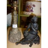 Carved serpentine lighthouse table lamp, and another Victorian figural spelter lamp base