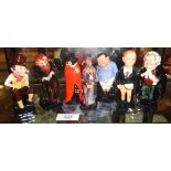 Five Royal Doulton Dickens figurines, and a Guy Fawkes and The Jester designed by C.J. Noke
