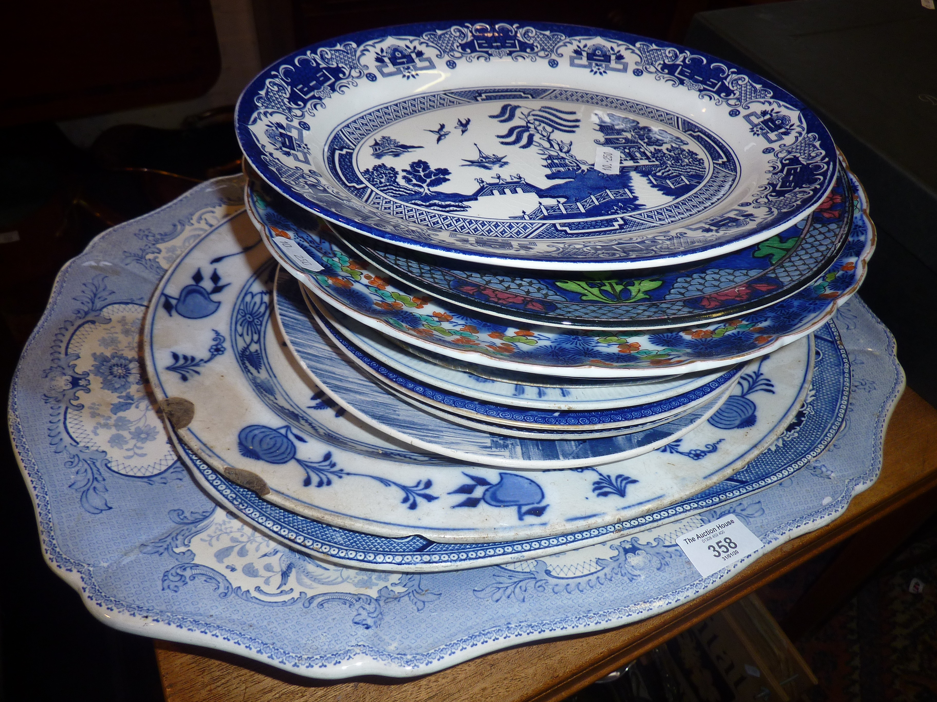 Quantity of blue and white transfer decorated meat platters and plates