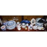 Shelf of blue and white Oriental and Chinese porcelain together with other ceramics and glassware,